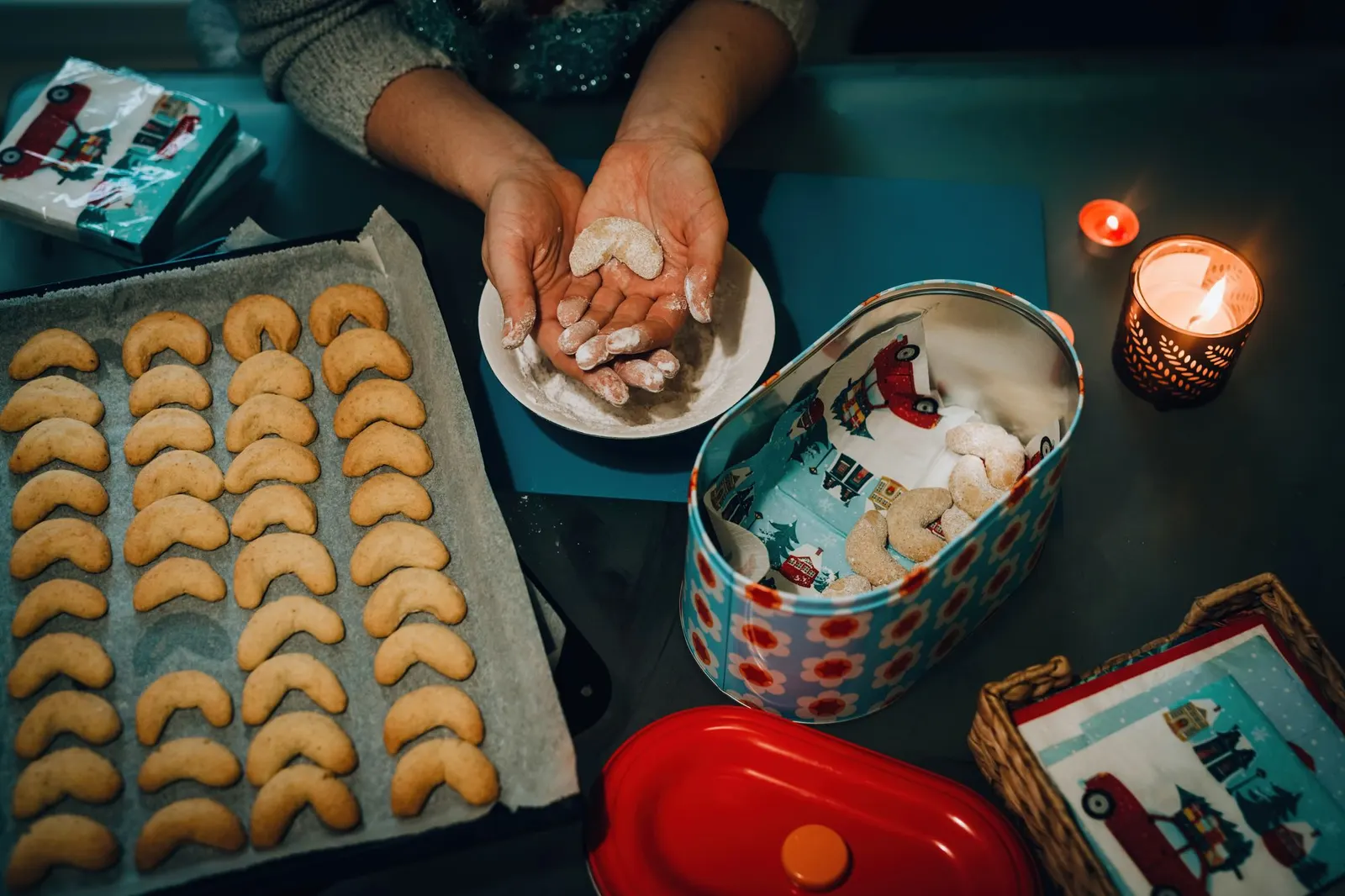 Freshly baked crescent cookies on a baking tray